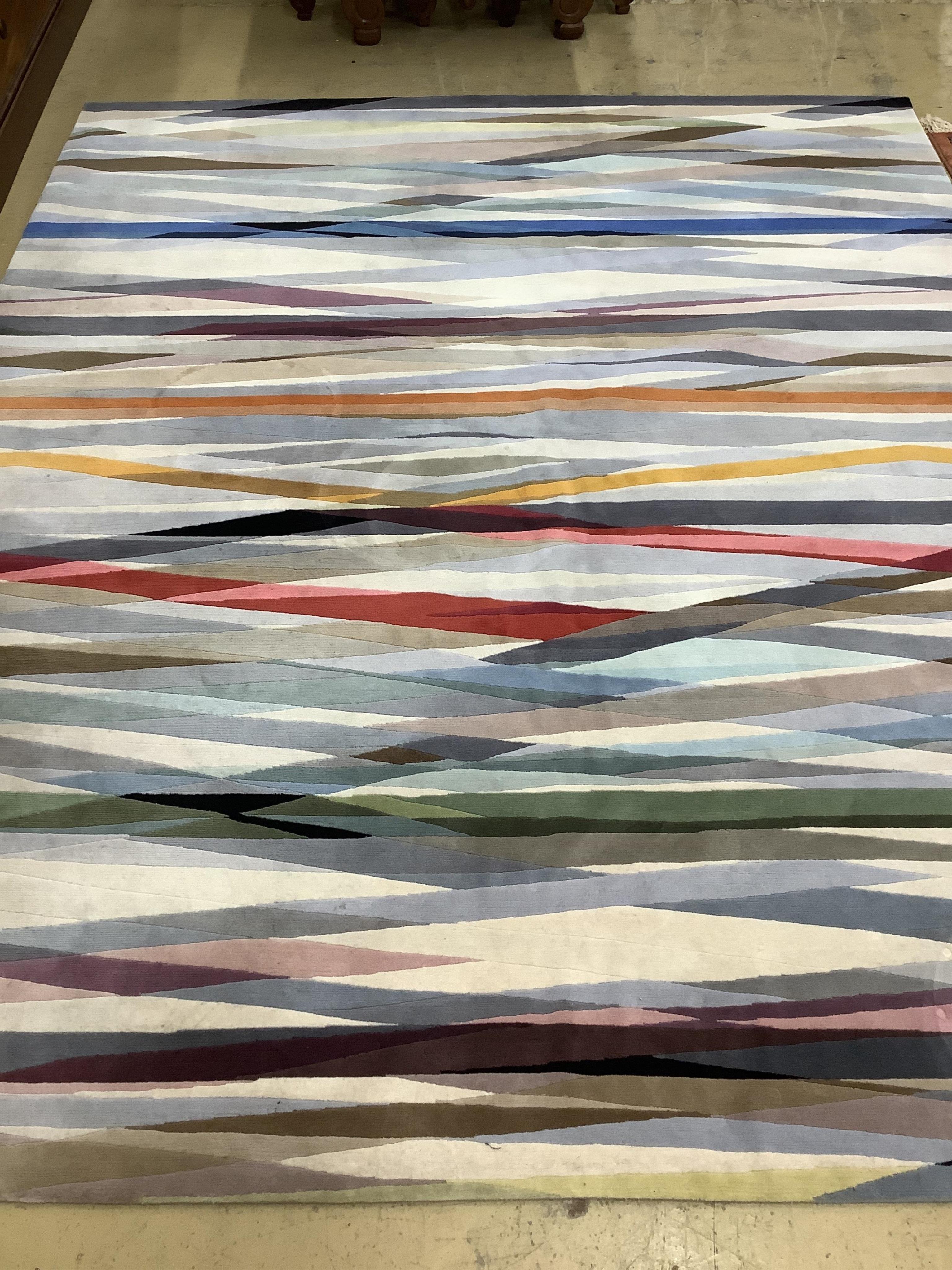 A Contemporary rug by Paul Smith, 304 x 248cm